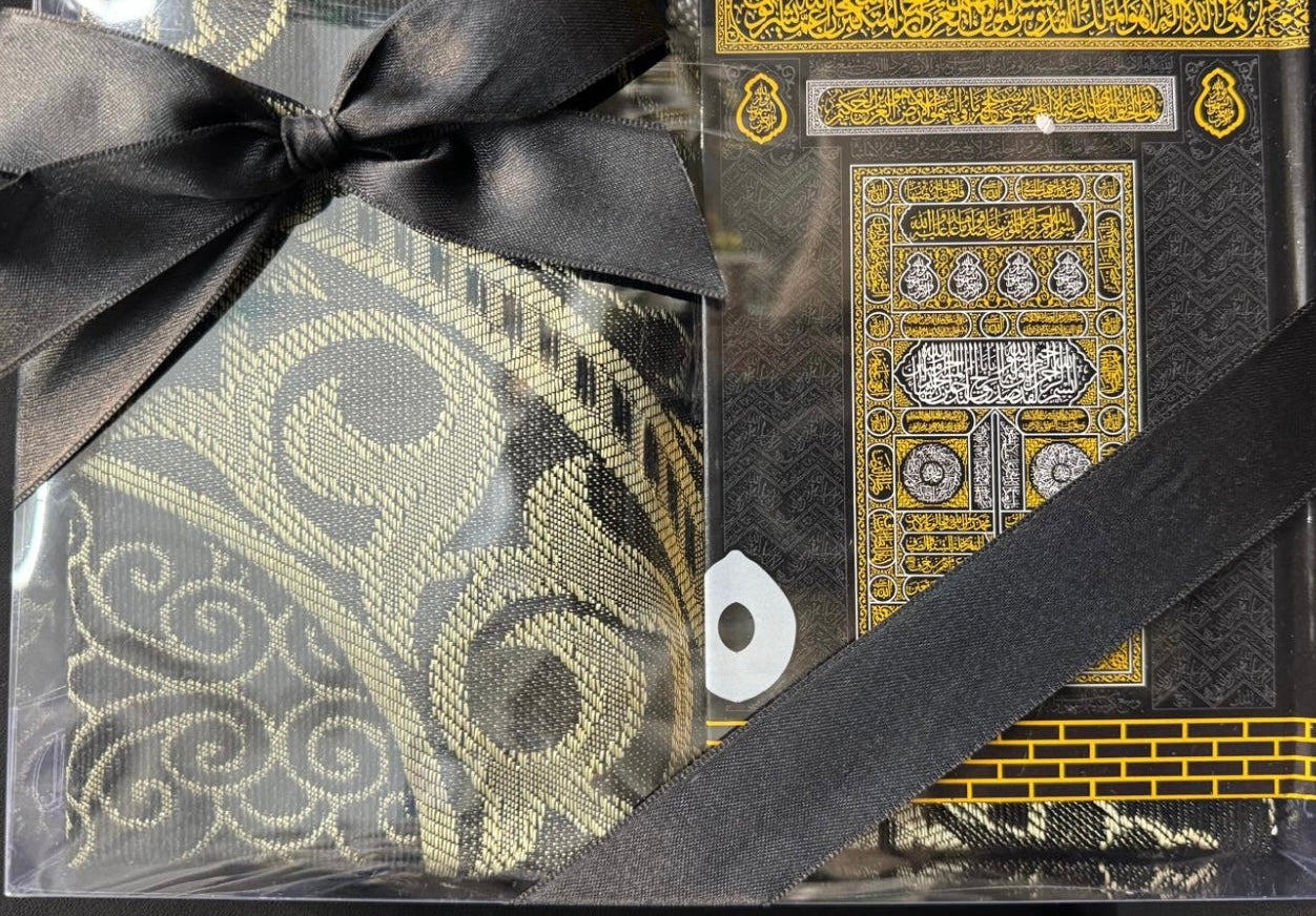 AL QURAN IN GIFT WRAPPED INCLUDES PRAYER MAT AND TASBIH